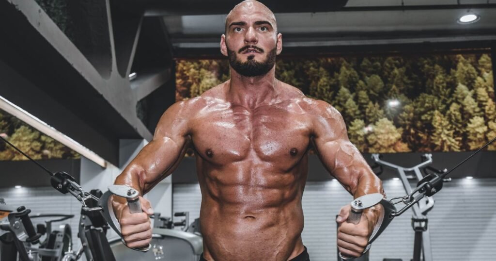 build muscle
burning fat
A man doing exercise
Man doing cable chest fly workout to lose weight without losing muscle and improve upper body strength in the gym."
