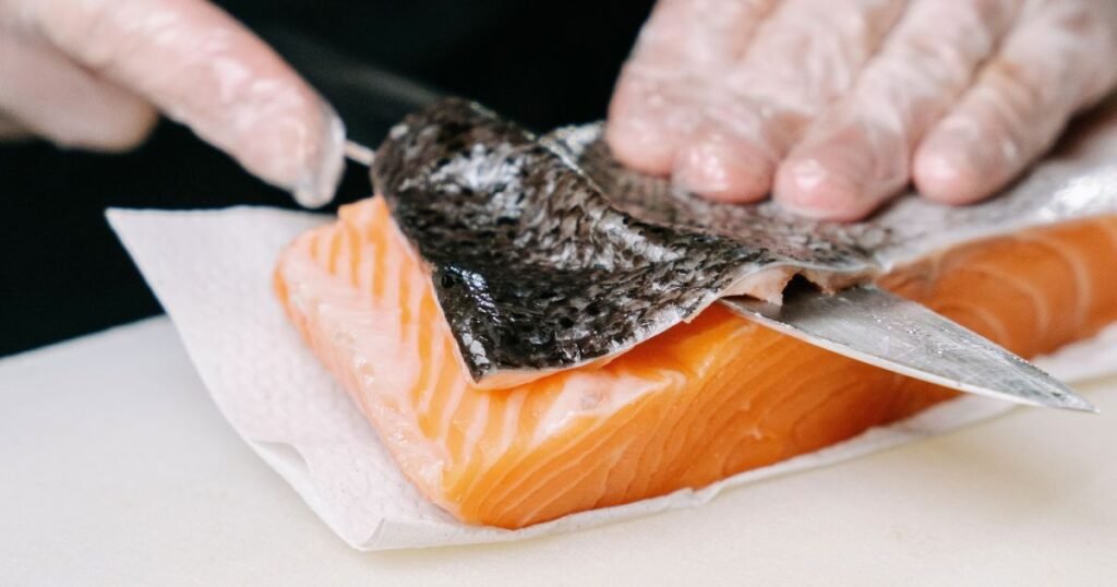 A man cutting the fish